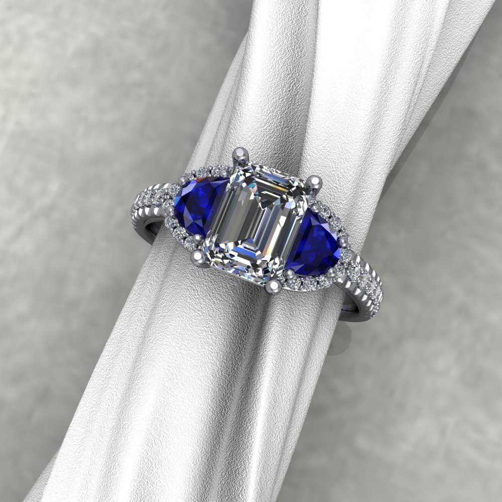 Emerald cut diamond in a custom ring by Simply Majestic jewelers